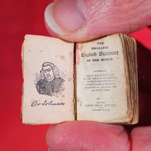 Load image into Gallery viewer, Smallest English Dictionary in the World. >>MINIATURE BRYCE DICTIONARY IN LOCKET<< Publication Date: 1900 CONDITION: GOOD