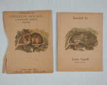 Load image into Gallery viewer, Carroll, Lewis, Invented by. Wonderland Postage-Stamp Case," [Alice with baby] [with] 12 separate pockets for stamps. Emberlin and Son, 4 Magdalen Street, Oxford. [1889].

