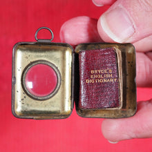 Load image into Gallery viewer, Smallest English Dictionary in the World. &gt;&gt;MINIATURE BRYCE DICTIONARY IN LOCKET&lt;&lt; Publication Date: 1900 CONDITION: GOOD
