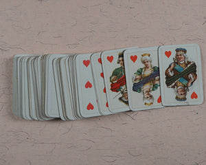 Miniature playing cards. Miniature antique playing cards in contemporary silver box. Unknown publisher. No place. Circa 1899.
