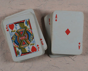 Miniature playing cards. Miniature antique playing cards in contemporary silver box. Unknown publisher. No place. Circa 1899.