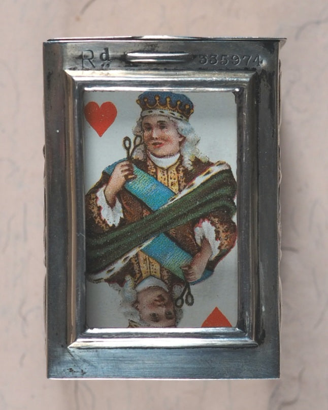 Miniature playing cards. Miniature antique playing cards in contemporary silver box. Unknown publisher. No place. Circa 1899.