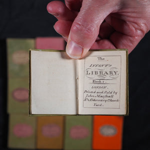 Infant's Library. Marshall, John. Circa 1800. 16 volumes. Complete with original sycamore bookcase.