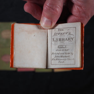 Infant's Library. Marshall, John. Circa 1800. 16 volumes. Complete with original sycamore bookcase.