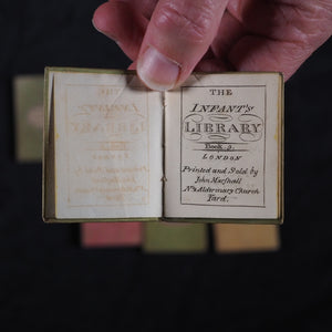 Infant's Library. Marshall, John. Circa 1800. 16 volumes. Complete with original sycamore bookcase.