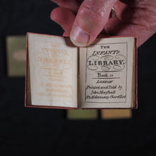 Load image into Gallery viewer, Infant&#39;s Library. Marshall, John. Circa 1800. 16 volumes. Complete with original sycamore bookcase.
