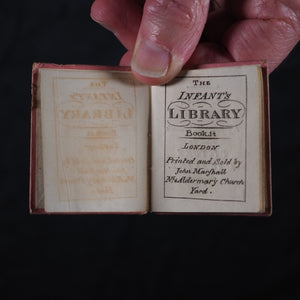 Infant's Library. Marshall, John. Circa 1800. 16 volumes. Complete with original sycamore bookcase.