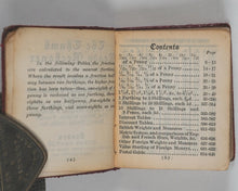 Load image into Gallery viewer, Thumb Ready Reckoner: containing calculations from one-sixteenth of a penny to nine shillings &amp; ninepence with interest/discount tables, British and foreign weights &amp; measures, metric system, foreign money, postal guide. Frowde, Henry. [London]. 1895.
