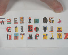 Load image into Gallery viewer, Reichert, Josua. Bilder-ABC : das kleinste Buch der Welt. Faber &amp; Faber. [Leipzig, Germany]. [2002]. ISBN 9783932545559.
