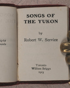Service, Robert W. Songs of the Yukon. Briggs, William. Toronto. 1913.