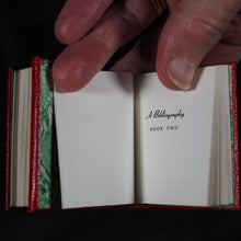 Load image into Gallery viewer, Levitan, Kalman. Miniature Books relating to Postage Stamps. Two volumes. 1983. with, Soliloquy of a Postage Stamp by Ernest W. Brady. Keepsake for Friends. 6 printed pages. 1978. Black Cat Press. Skokie. Illinois. Dos-a-dos-a-dos binding.
