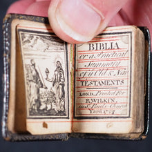 Load image into Gallery viewer, Biblia or a Practical Summary of Old &amp; New Testaments. 1728. Wilkin, R. [London]. 1727. Underlined in red and hand corrected to 1728. Black binding.
