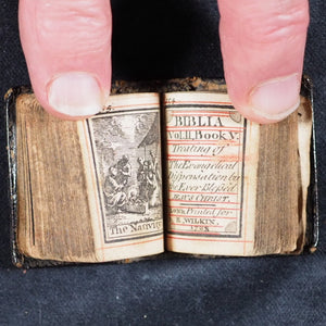 Biblia or a Practical Summary of Old & New Testaments. 1728. Wilkin, R. [London]. 1727. Underlined in red and hand corrected to 1728. Black binding.