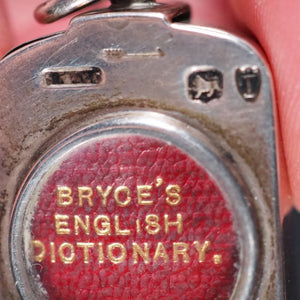 Smallest English Dictionary in the World. Comprising: besides the ordinary & newest words in the language, short explanations of a large number of scientific, philosophical, literary & technical terms. Bryce, David & Son. Glasgow. 1893. SILVER LOCKET