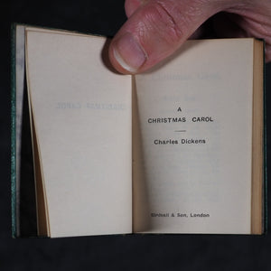 Dickens, Charles Christmas Stories. Birdsall & Sons [Northampton]. Circa 1908. Complete five volume set on original oak book display.