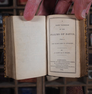 Book of Common Prayer and Administration of the Sacraments. Together with the Psalter or Psalms of David [bound with] A New Version of the Psalms of David, by N.Tate and N.Brady. Church of England Miniature Prayerbook. 1834