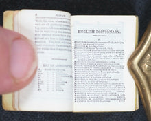 Load image into Gallery viewer, Smallest English Dictionary in the World. MINIATURE BRYCE DICTIONARY IN LOCKET; Publication Date: 1900 CONDITION: VERY GOOD
