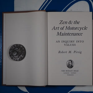 Zen and the Art of Motorcycle Maintenance. Robert M. Pirsig. ISBN 10: 0370103386 / ISBN 13: 9780370103389 Published by William Morrow, 1974 Condition: Very Good Hardcover