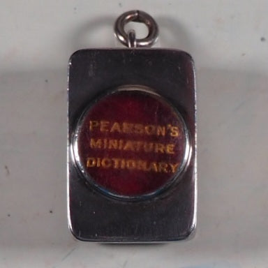 Smallest English Dictionary in the World. Comprising: besides the ordinary and newest words in the language, short explanations of a large number of scientific, philosophical, literary and technical terms. [SOLID SILVER LOCKET].1893. >>MINIATURE BOOK<<